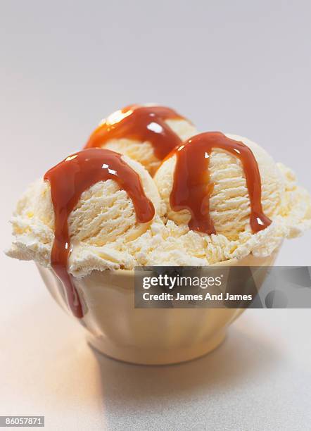 vanilla ice cream with caramel sauce - vanilla ice cream stock pictures, royalty-free photos & images