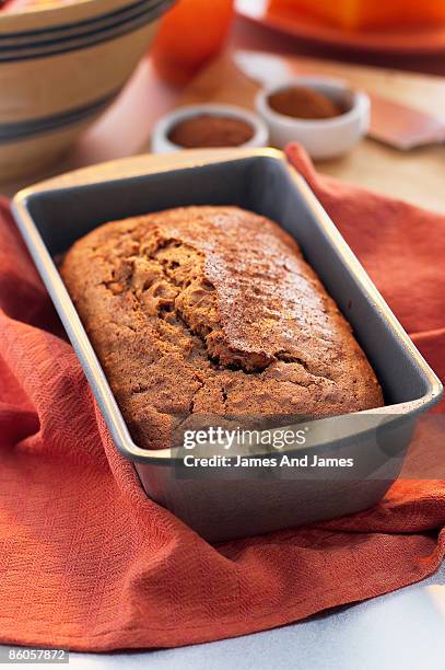 fresh baked pumpkin bread - loaf pan stock pictures, royalty-free photos & images