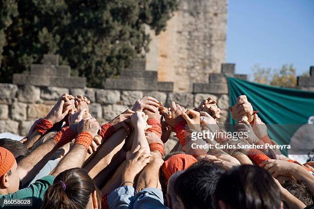 castellers in sant cugat del valles, barcelona, spain - human pyramid stock pictures, royalty-free photos & images