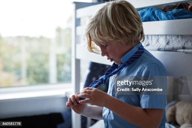 family getting ready for school in the morning - school uniform stock pictures, royalty-free photos & images