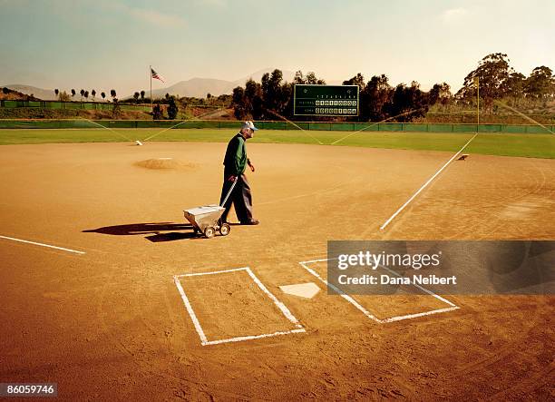 man on baseball diamond - dana workman stockfoto's en -beelden