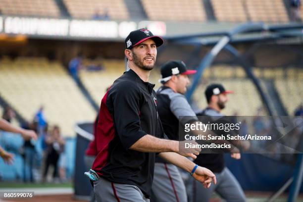 Adam Rosales of the Arizona Diamondbacks warms up during batting practice prior to game one of the National League Division Series against the Los...