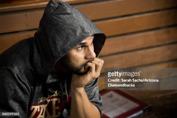 Reymond Fuentes of the Arizona Diamondbacks sits in the dugout during game one of the National League Division Series against the Los Angeles Dodgers...