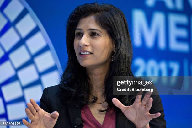 Gita Gopinath, professor of economics at Harvard University, speaks during a debate at the International Monetary Fund and World Bank Group Annual...