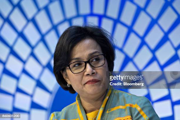Sri Mulyani Indrawati, Indonesia's minister of finance, listens during a debate at the International Monetary Fund and World Bank Group Annual...