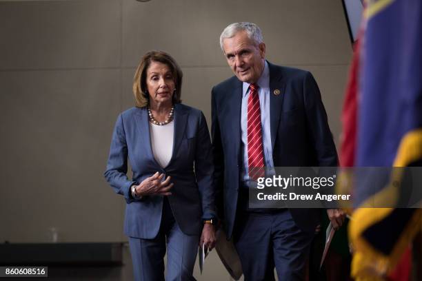 House Minority Leader Nancy Pelosi talks with Rep. Lloyd Doggett as they arrive for a news conference on Republican plans to end the state and local...