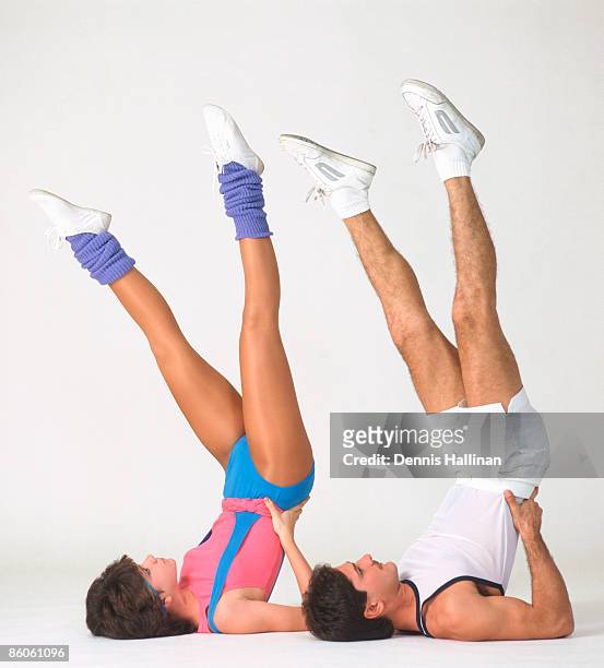 retro couple wearing spandex doing aerobics - meia sem pé imagens e fotografias de stock
