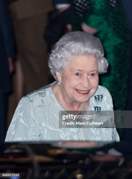 Queen Elizabeth II leaves after a reception to mark the Centenary of the Women's Royal Navy Service and the Women's Auxiliary Army Corp at The Army &...