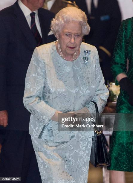 Queen Elizabeth II leaves after a reception to mark the Centenary of the Women's Royal Navy Service and the Women's Auxiliary Army Corp at The Army &...