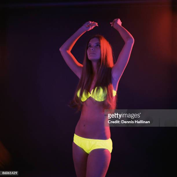 Woman Go-Go Dancing with Glowing Underwear