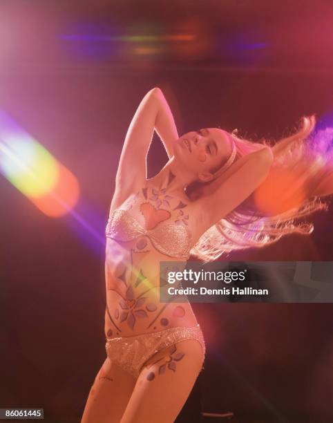 Young Woman Dancing to Go-Go Music