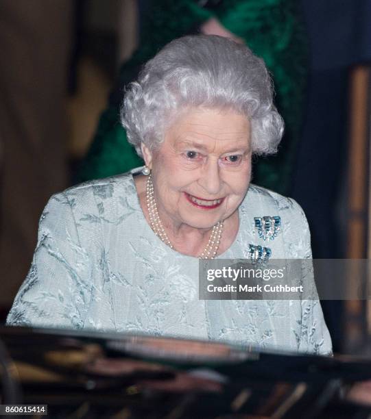 Queen Elizabeth II leaves after a reception to mark the Centenary of the Women's Royal Navy Service and the Women's Auxiliary Army Corp at The Army &...