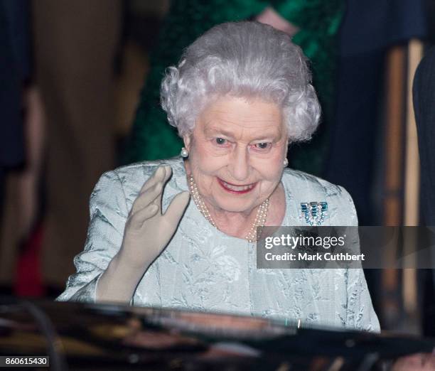 Queen Elizabeth II leaves after a reception to mark the Centenary of the Women's Royal Navy Service and the Women's Auxiliary Army Corp at The Army &...