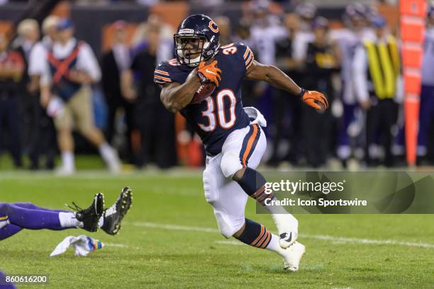 Chicago Bears running back Benny Cunningham runs for a touchdown after a catch thrown by Chicago Bears punter Pat O'Donnell on a fake punt in the 3rd...