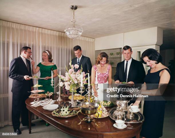 Group of adults enjoying dinner party