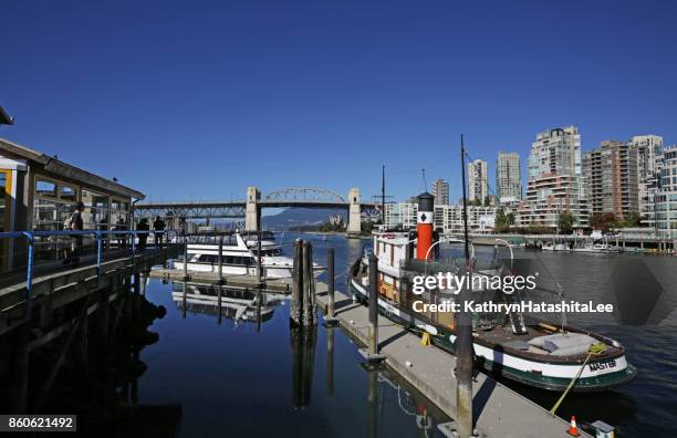 vancouver's granville island and yaletown high- rises in autumn - granville island market stock pictures, royalty-free photos & images