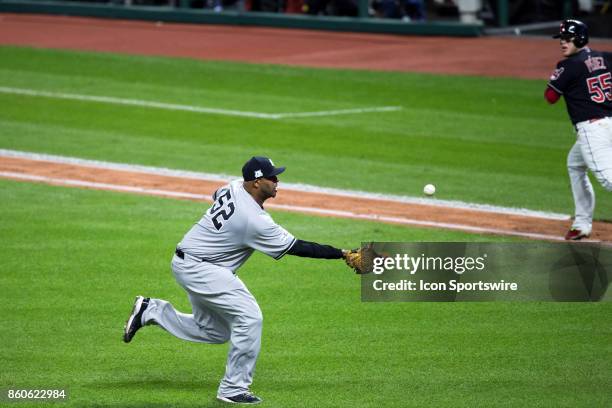 New York Yankees starting pitcher CC Sabathia makes a catch on a popup bunt by Cleveland Indians catcher Roberto Perez during the third inning of the...