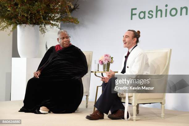 Andre Leon Talley and John Galliano speak onstage during Vogue's Forces of Fashion Conference at Milk Studios on October 12, 2017 in New York City.