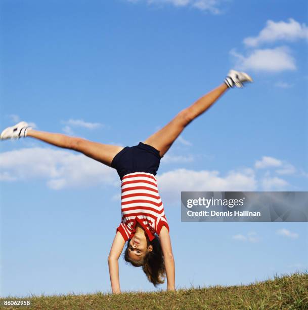 Cartwheel Example 372 Cartwheel Gymnastics Stock Photos, High-Res Pictures, and Images ...