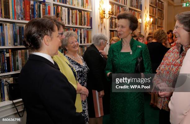 Princess Anne, centre, talks to guests at a reception to celebrate the Women's Royal Naval Service 100 project at The Army and Navy Club on October...