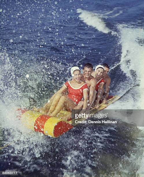 Friends on water sled