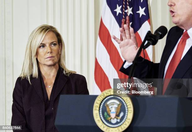 Kirstjen Nielsen, U.S. Secretary of Homeland Security nominee, listens to an introduction from U.S. President Donald Trump at the White House in...
