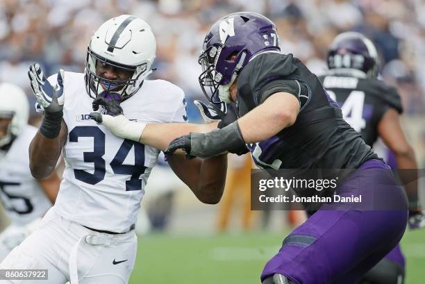 Shane Simmons of the Penn State Nittany Lions rushes against Blake Hance of the Northwestern Wildcats at Ryan Field on October 7, 2017 in Evanston,...