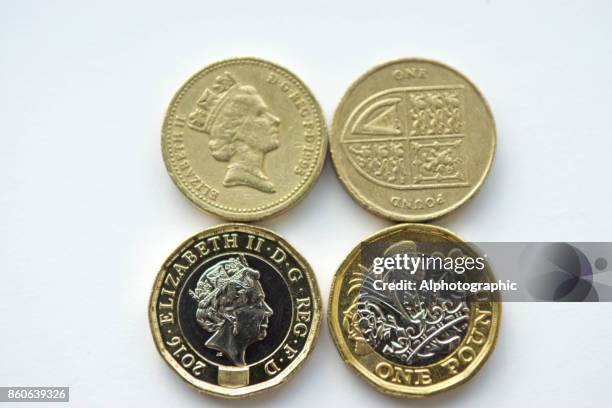 new and old pound coins - pound coins stock pictures, royalty-free photos & images