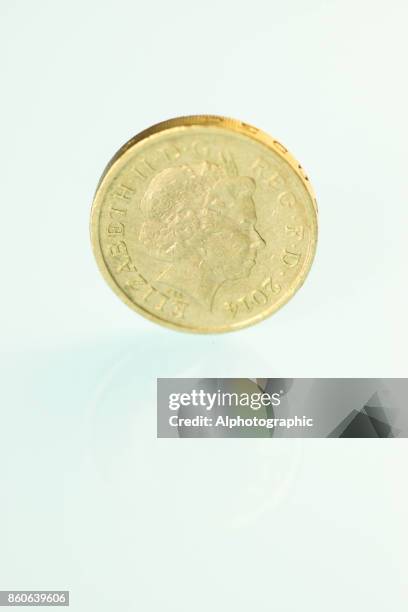 new pound coin released 2017 - balance finance minimal stock pictures, royalty-free photos & images