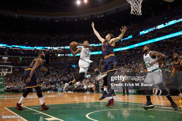 Playoffs: Boston Celtics Marcus Smart in action vs Cleveland Cavaliers Kevin Love at TD Garden. Game 2. Boston, MA 5/19/2017 CREDIT: Erick W. Rasco