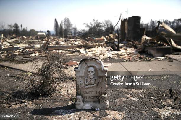 Halloween decoration is the only thing left standing in front of homes that were destroyed by the Tubbs Fire on October 12, 2017 in Santa Rosa,...