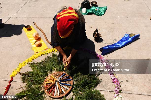 Nahua Pipil indigenous woman participates in a ceremony commemorating the International Day of Indigenous Resistance at the Salvador del Mundo square...