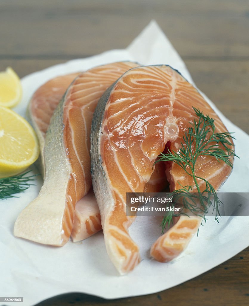 Raw salmon on butcher paper