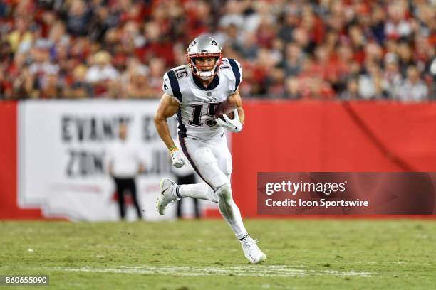 New England Patriots wide receiver Chris Hogan runs after a reception during an NFL football game between the New England Patriots and the Tampa Bay...