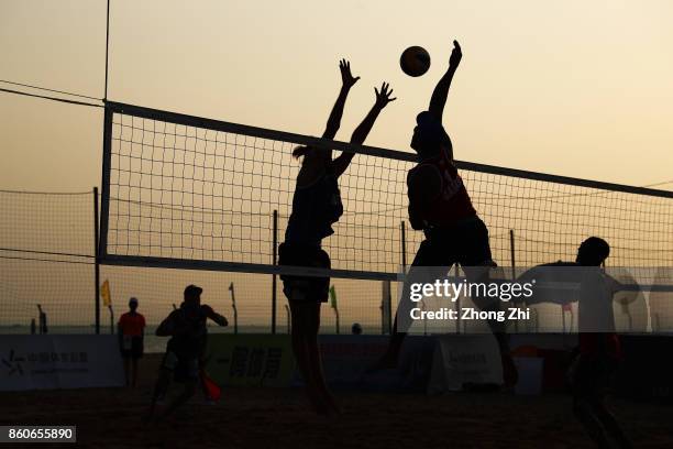 Florian Schnetzer and Daniel Mullner of Austria in action during the match against Jefferson Santos Pereira and Cherif Younousse of Qatar on Day 2 of...