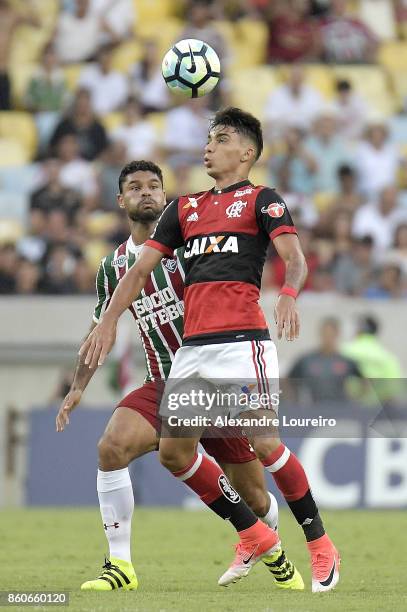 Lucas Paquet of Flamengo battles for the ball with Gum of Fluminense during the match between Flamengo and Fluminense as part of Brasileirao Series A...