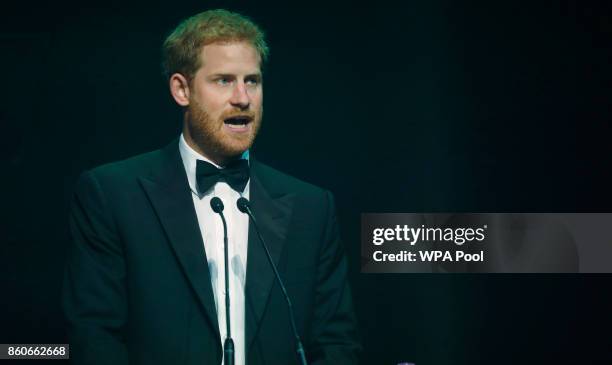 Prince Harry talks after receiving a posthumous Attitude Legacy Award on behalf of his mother Diana, Princess of Wales, at the Attitude Awards on...