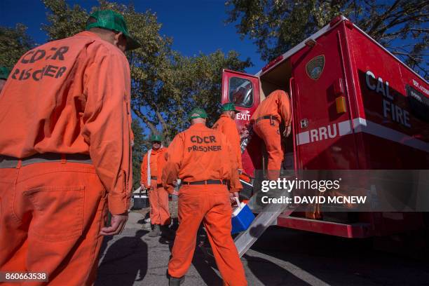 Prisoners at Oak Glen Conservation Camp leave the minimum security prison for work deployment under the authority of Cal Fire, during which time they...