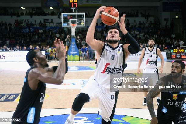 Alessandro Gentile of Segafredo competes with Dominique Sutton and Chane Behanan of Dolomiti Energia during the LBA LegaBasket match between Virtus...