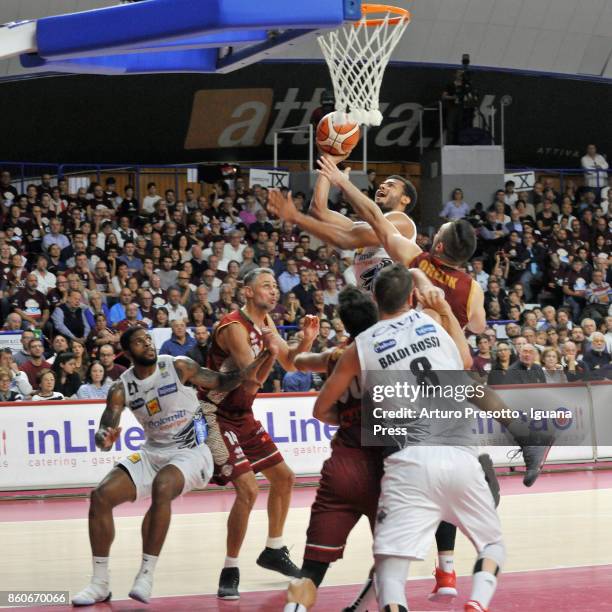 Chane Behanan and Shavon Shields and Filippo Baldi Rossi of Dolomiti Energia competes with Tomas Ress and Michael Watt and Gediminas Orelik of Umana...