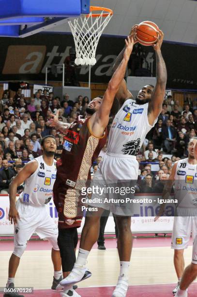 Shavon Shields and Chane Behanan and Toto Forray of Dolomiti Energia competes with Michael Watt of Umana during the LBA LegaBasket of Serie A1 match...