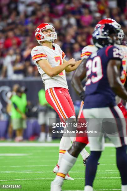 Kansas City Chiefs kicker Harrison Butker watches his field goal attempt sail through the uprights during the football game between the Kansas City...