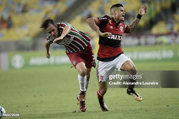 Everton of Flamengo battles for the ball with Lucas of Fluminense during the match between Flamengo and Fluminense as part of Brasileirao Series A...