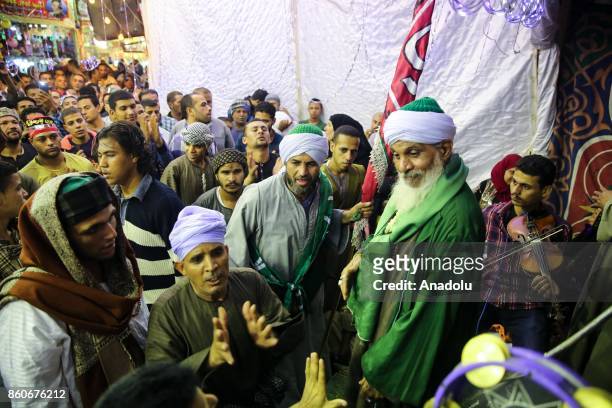 Egyptian people attend the birthday celebrations of the founder of the Badawiyyah Sufi order Ahmad al-Badawi at Seyyid Al-Badawi Mosque in Tanta,...