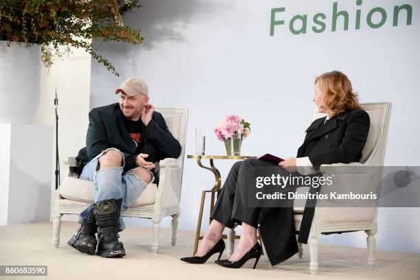 Demna Gvasalia and Sarah Mower speak onstage during Vogue's Forces of Fashion Conference at Milk Studios on October 12, 2017 in New York City.