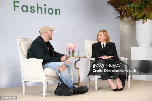 Demna Gvasalia and Sarah Mower speak onstage during Vogue's Forces of Fashion Conference at Milk Studios on October 12, 2017 in New York City.