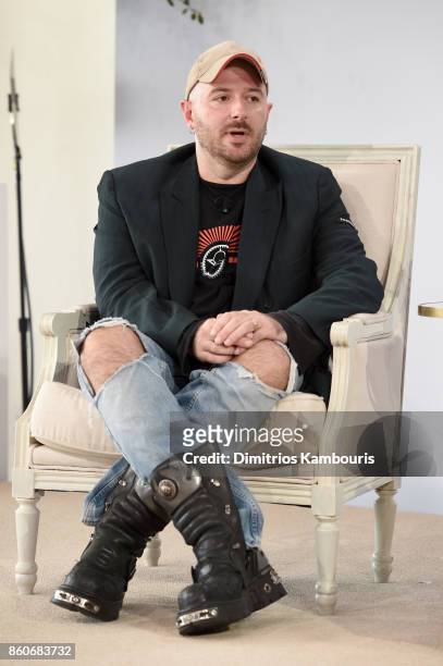 Balenciaga Creative Director Demna Gvasalia speaks onstage during Vogue's Forces of Fashion Conference at Milk Studios on October 12, 2017 in New...