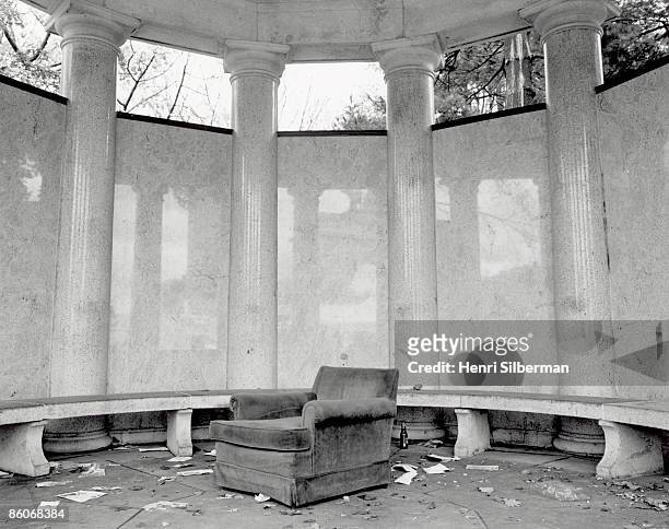 abandoned chair surrounded by columns - hiding rubbish stock pictures, royalty-free photos & images