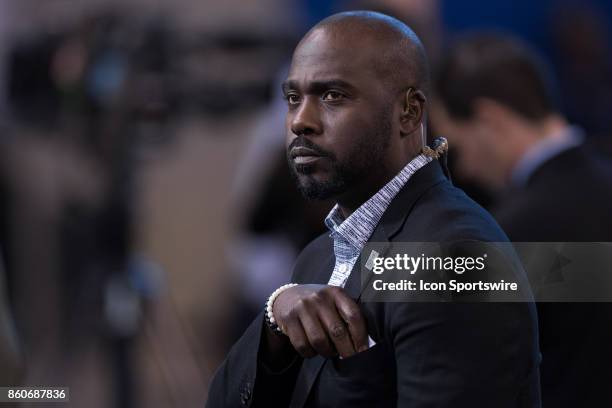 Networks Marshall Faulk on the field before the NFL game between the San Francisco 49ers and Indianapolis Colts on October 8 at Lucas Oil Stadium in...