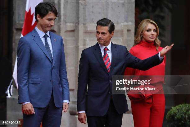 Enrique Peña Nieto President of Mexico talks to Canadian Prime Minister Justin Trudeau and Mexican First Lady Angelica Rivera during a meeting as...